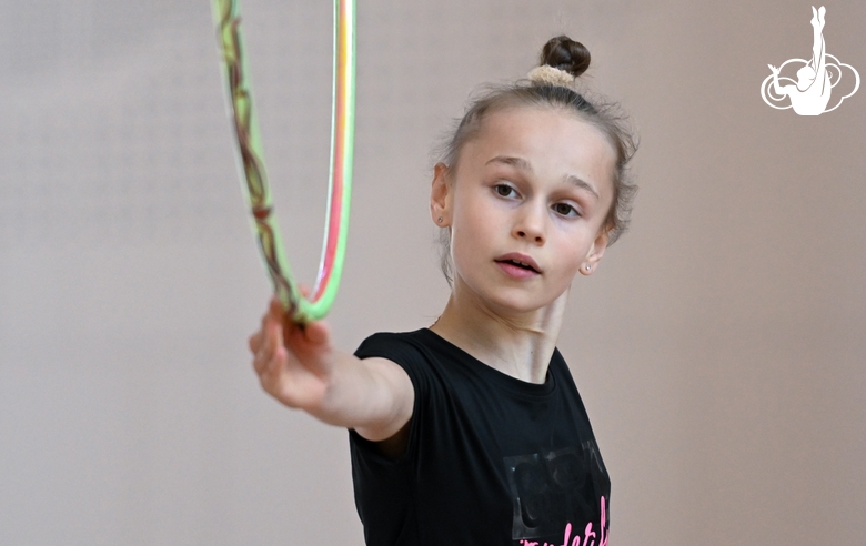 Yana Zaikina during an exercise with a hoop