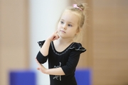 Young gymnast during training