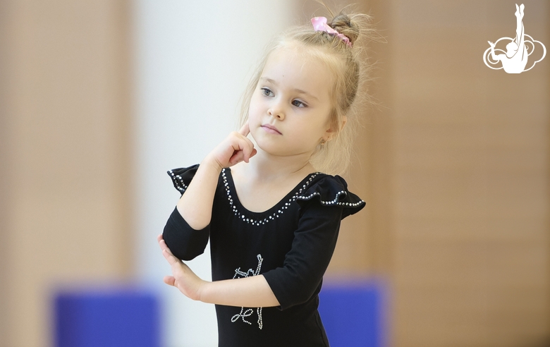 Young gymnast during training