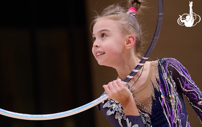 Elvira Belyaeva during an exercise with a hoop at the control training session