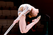 An athlete during an exercise with a hoop