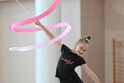 Yana Zaikina during an exercise with a ribbon