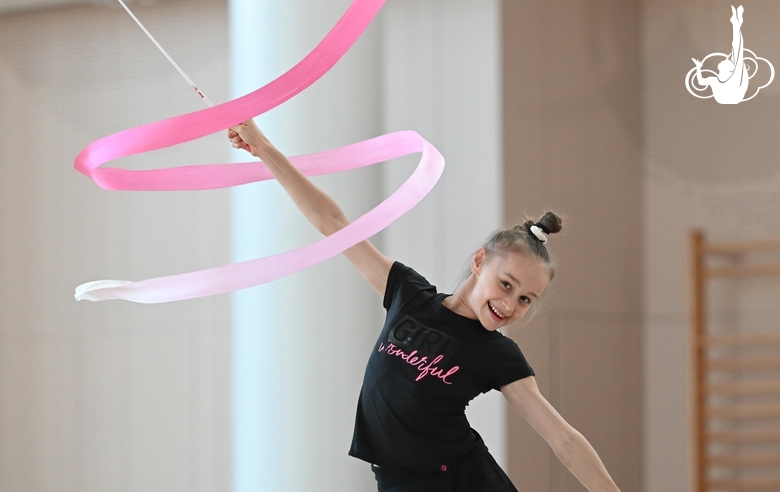 Yana Zaikina during an exercise with a ribbon