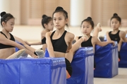 Chinese gymnasts stretching