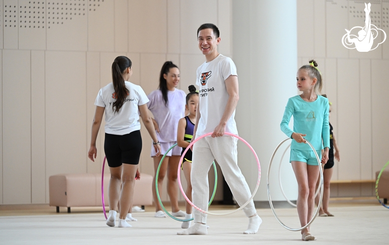 Choreographer Alexander Buklov with gymnasts from the Amur Tiger society during training