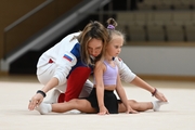 Academy Coach Olesya Kovaleva with a young gymnast during the selection