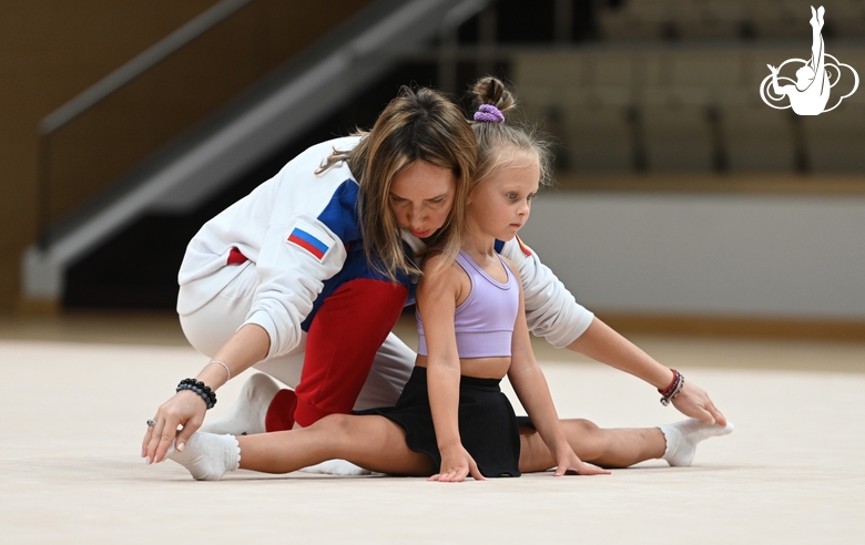 Academy Coach Olesya Kovaleva with a young gymnast during the selection