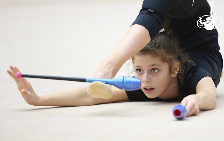 Karolina Tarasova during an exercise with clubs