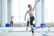 A gymnast from China during the ribbon exercise when training