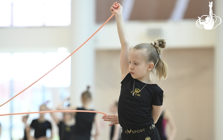 Gymnast during an exercise with a jump rope