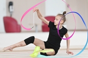 Kristina Voitenko working on a program with a ribbon