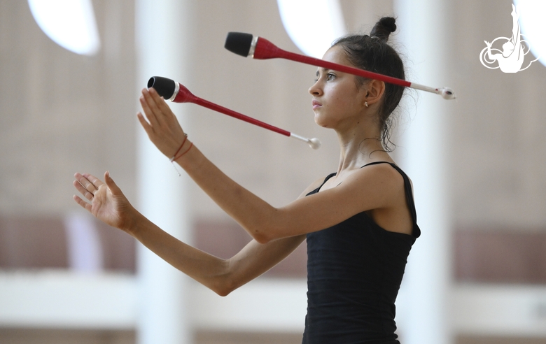 Anna Vakulenko during an exercise with clubs