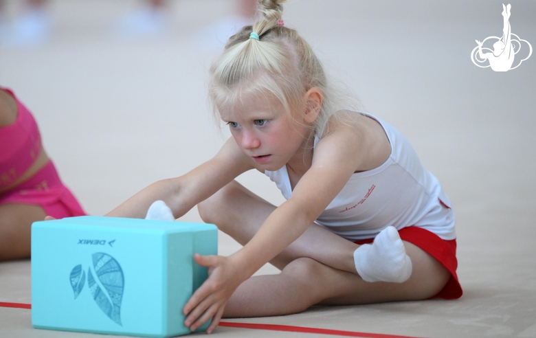 A young gymnast during the training session