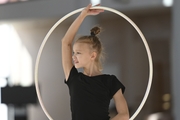 Kristina Voitenko does a hoop exercise