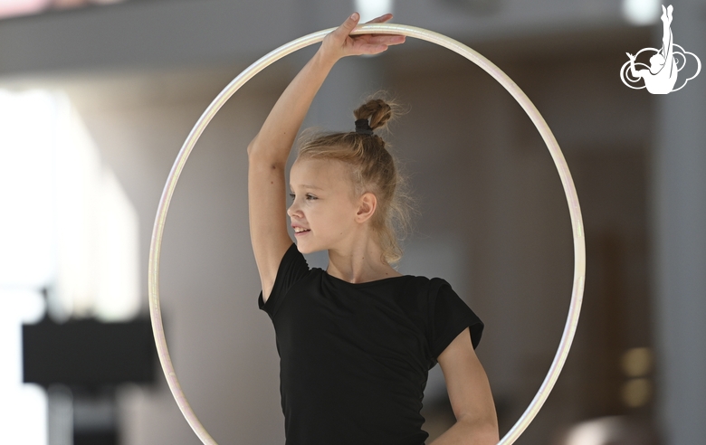 Kristina Voitenko does a hoop exercise