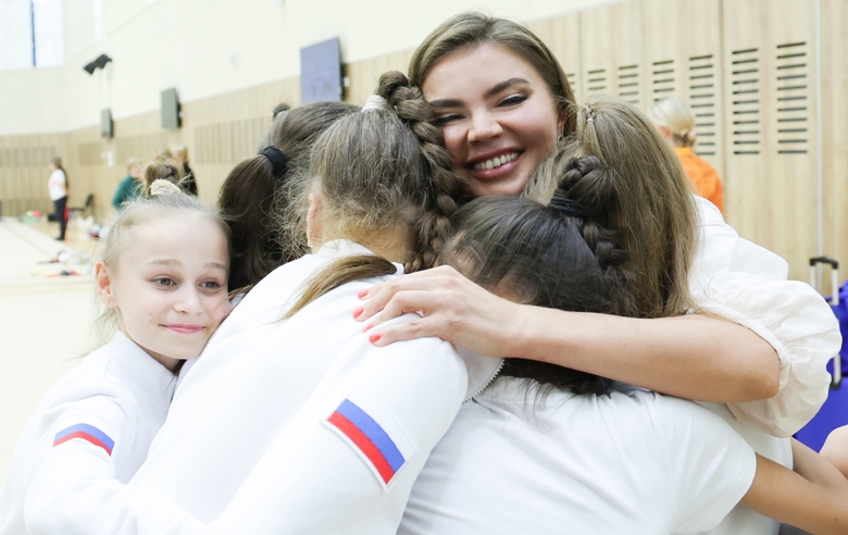 Olympic champion Alina Kabaeva with Academy gymnasts