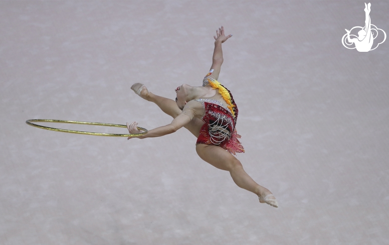 Vladislava Sharonova (Russia) doing an exercise with a hoop