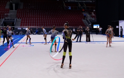 A conversation was captured between Alina Kabaeva and coach Evgeniya Eliseeva regarding a new leotard for Yana Zaikina from Volgograd, made for her ribbon routine