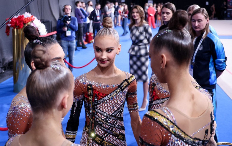 February 28, 2026. Olympic champion Alina Kabaeva next to the Academy group gymnasts at the Russian Championship in Moscow