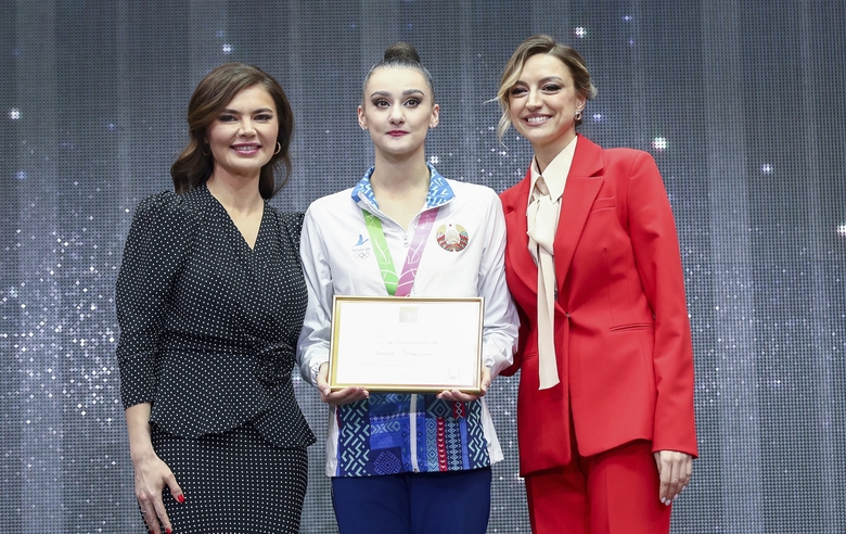 Olympic champion Alina Kabaeva, Belarusian gymnast Alina Harnasko and Olympic champion Evgenia Kanaeva (left to right)