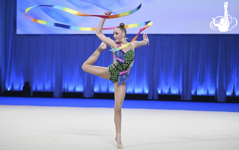 Natalia Usova during an exercise with a ribbon