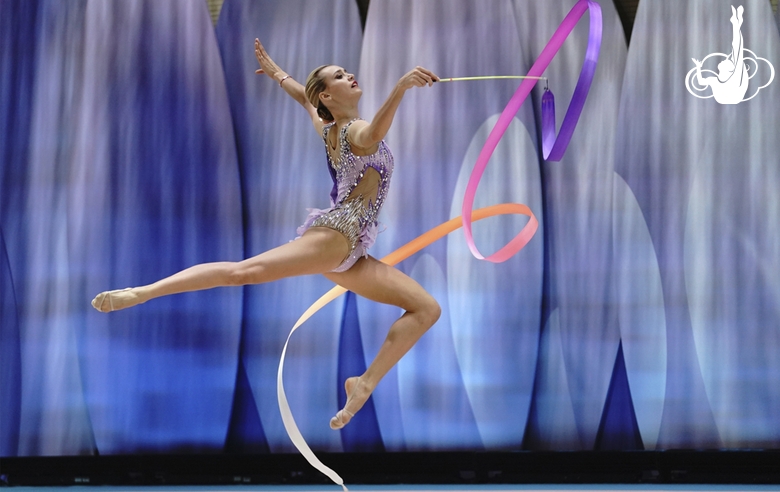 Maria Pobedushkina (Russia) doing an exercise with a ribbon