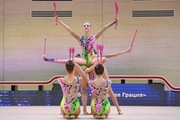 Gymnasts during an exercise with clubs