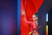 Yana Sakovich during the exercise with clubs