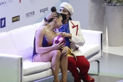 Lala Kramarenko (Russia) after her performance with a ball with Irina Viner in the kiss & cry zone