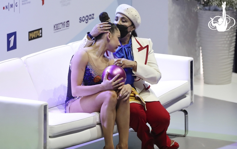 Lala Kramarenko (Russia) after her performance with a ball with Irina Viner in the kiss & cry zone