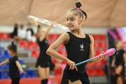 Ksenia Savinova during an exercise with clubs  at floor testing