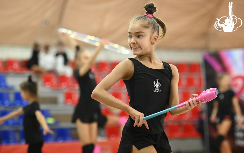 Ksenia Savinova during an exercise with clubs  at floor testing