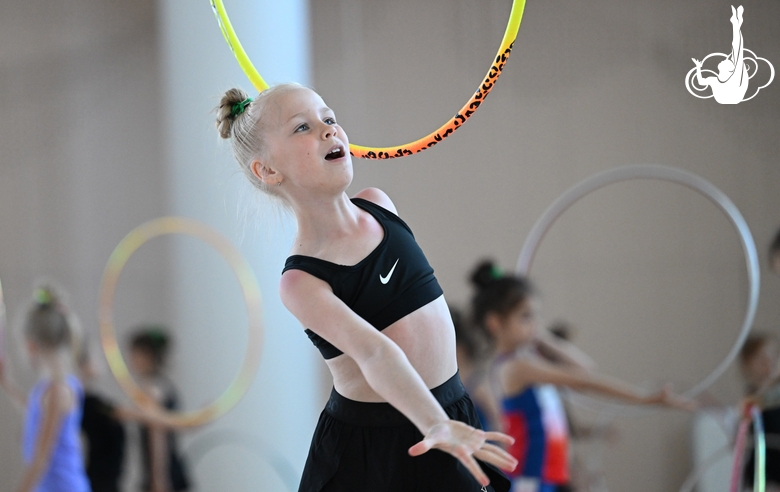 Gymnast from the Amur Tiger society during an exercise with a hoop