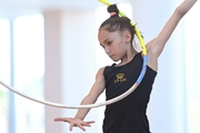 Valeria Medvedeva doing an exercise with a hoop