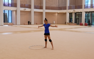 A fragment of Mariia Borisova's work on the hoop exercise