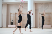 Karolina Tarasova, choreographer Irina Zenovka and Arina Averina during a class at the Academy