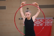 Gymnast during an exercise with a hoop during floor testing