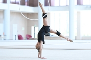 Kristina Voitenko does a hoop exercise