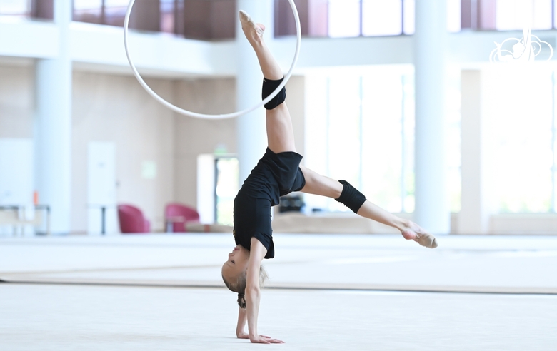 Kristina Voitenko does a hoop exercise