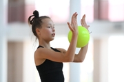 A gymnast during practice at the training camp in the Academy
