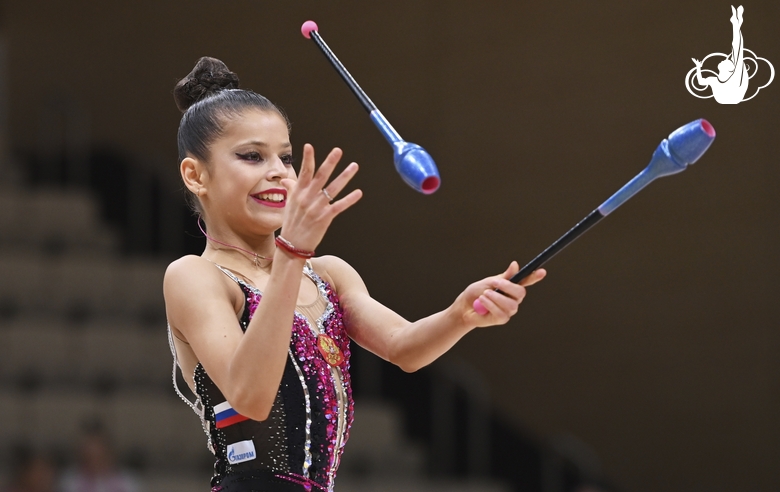 Karolina Tarasova during an exercise with clubs