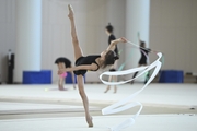 Sabina Samatova during an exercise with a ribbon during training at the Academy