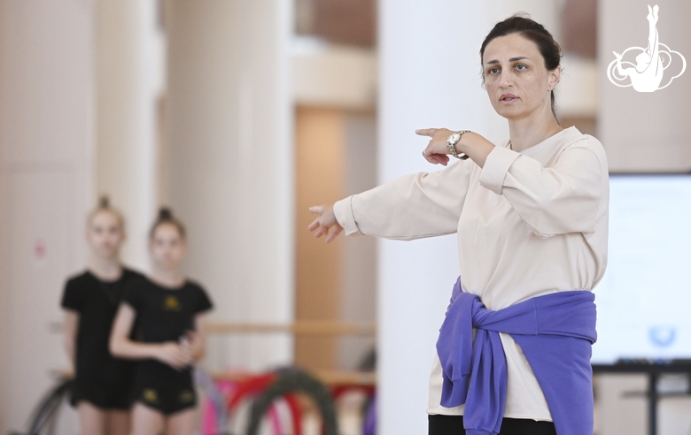 Academy coach Irina Dzyuba with gymnasts during class