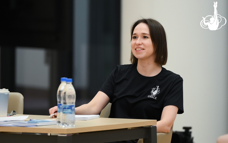 Coach Olga Minigalina during Arina Tkachuk's training session