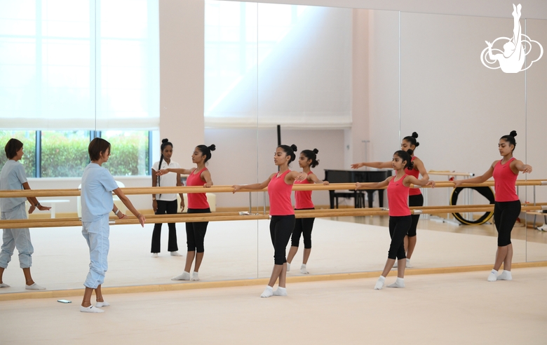 Gymnasts and Academy choreographer Ekaterina Belova during choreography