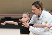 Academy Coach Olesya Kovaleva with a young gymnast during the selection