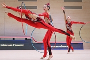 Gymnasts during an exercise with hoops