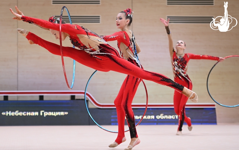 Gymnasts during an exercise with hoops