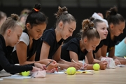 Gymnasts during a session with a psychologist at the training camp in the Academy