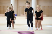 Young gymnasts during training